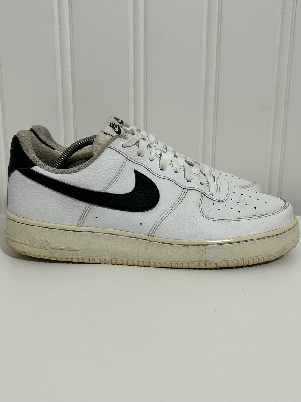 Nike Air Force 1 White and Black Low-Top Leather Sneakers